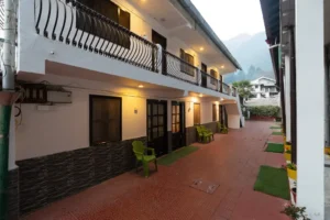 Guest room corridor with outdoor access at Royal Heritage Nainital