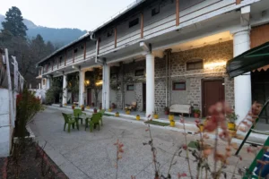 Courtyard with seating and heritage rooms at Royal Heritage Nainital