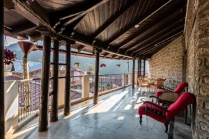 Balcony seating area with mountain views at Royal Heritage Nainital